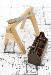 http://www.dreamstime.com/royalty-free-stock-photo-construction-tools-house-plans-image1707355